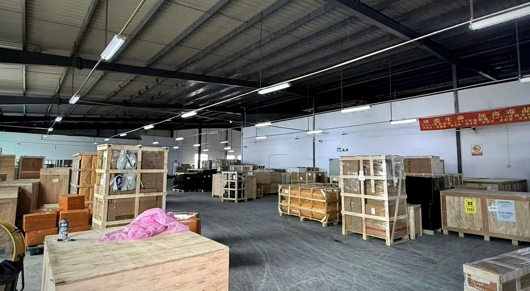 BuildCargo Logistics warehouse storing bulky furniture and building-material cargo in order