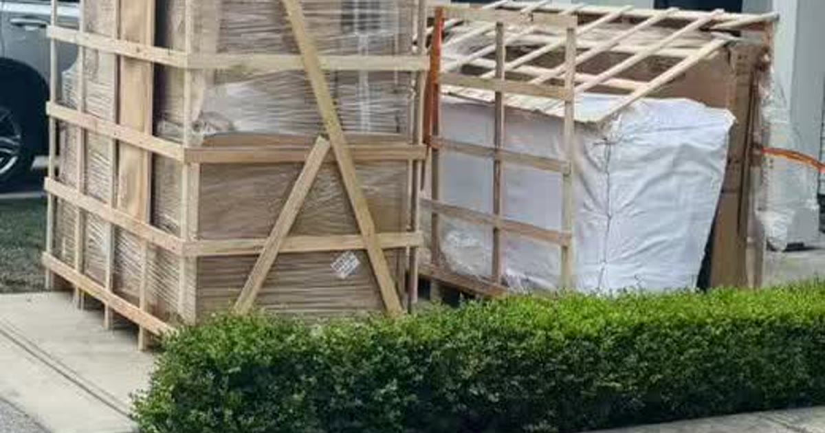 Export-crated household goods at a completed Canadian residential handover.