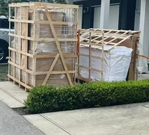 Export-crated household cargo after completed delivery to a Canadian home